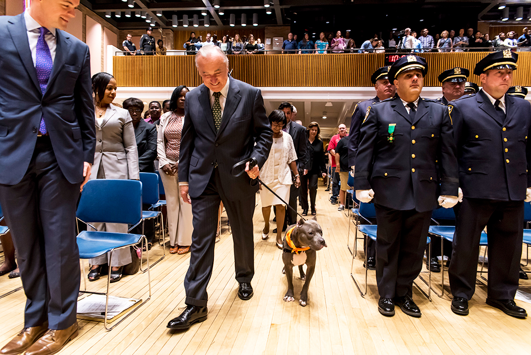 Bratton and Zaza walking to the stage