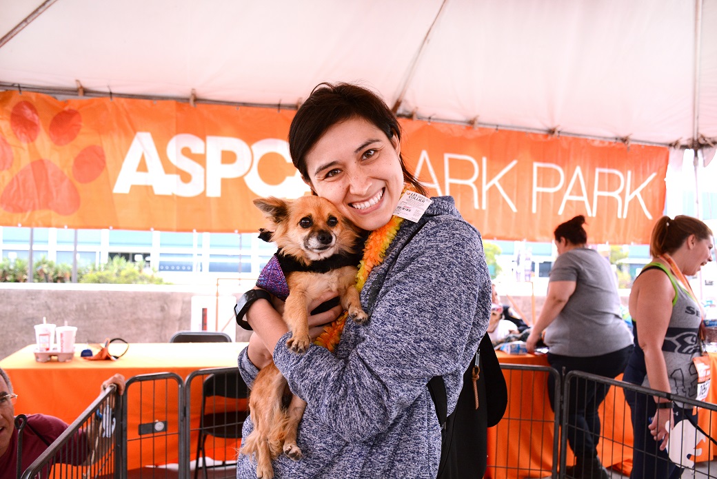 Team ASPCA member with dog