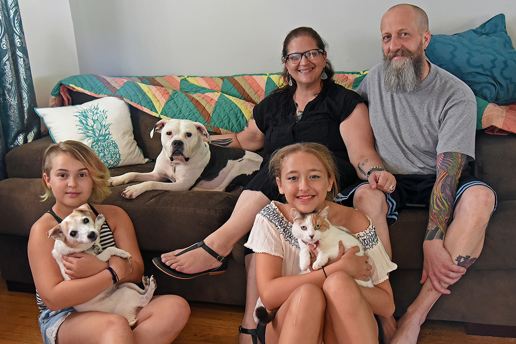 Holstein with his family and their other pets