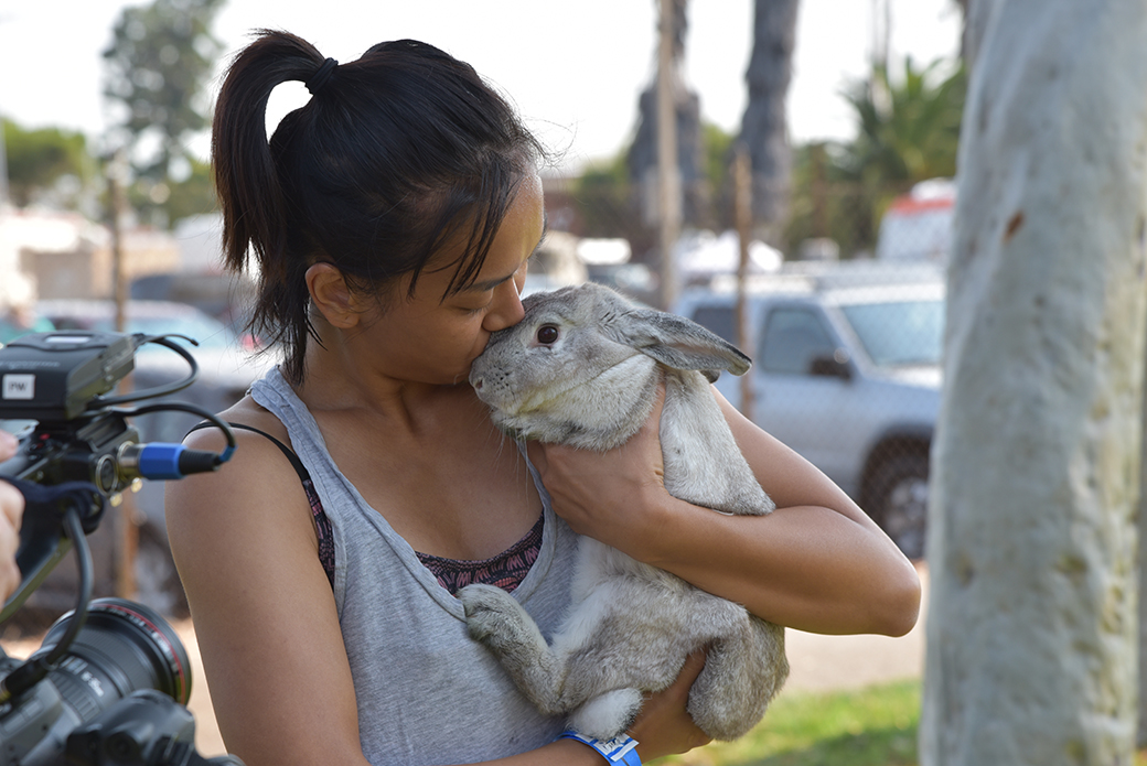 a woman with a bunny