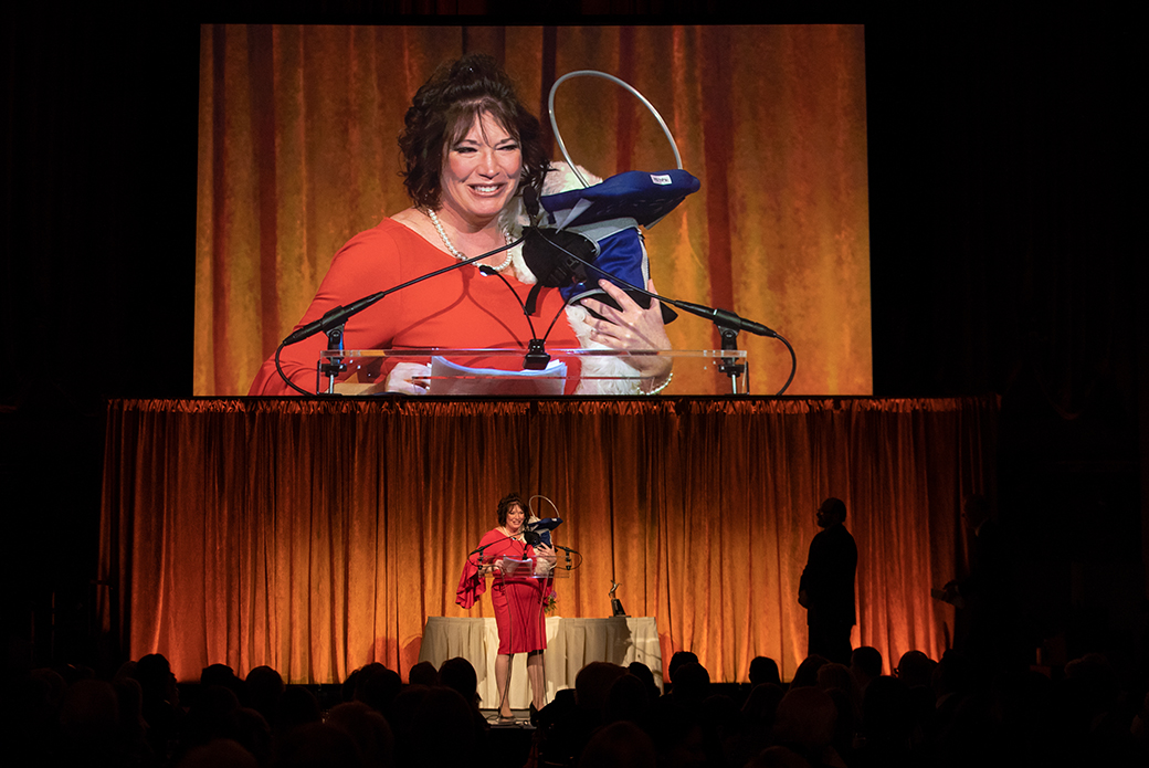 Lisa and Noah accepting the award