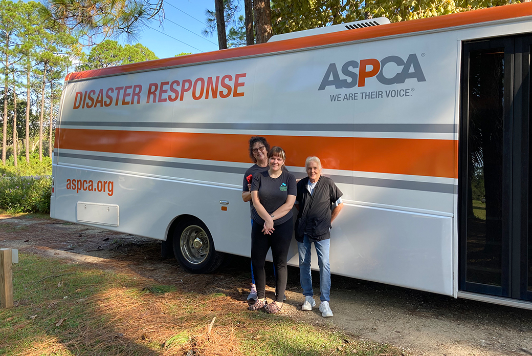 volunteers in front of a disaster relief van