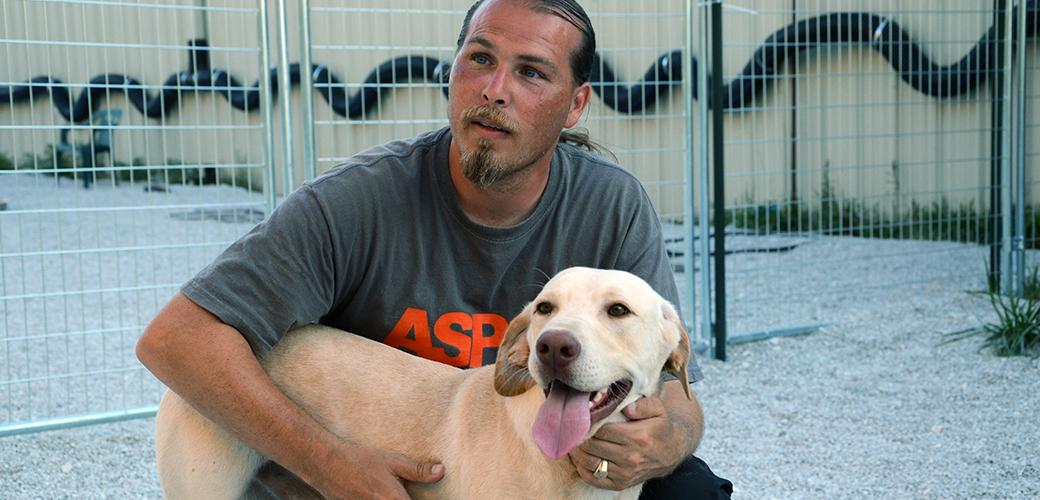 Tim Rickey and a rescued dog