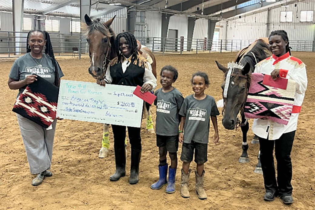 Angelica and Abigail posing with their family and horses