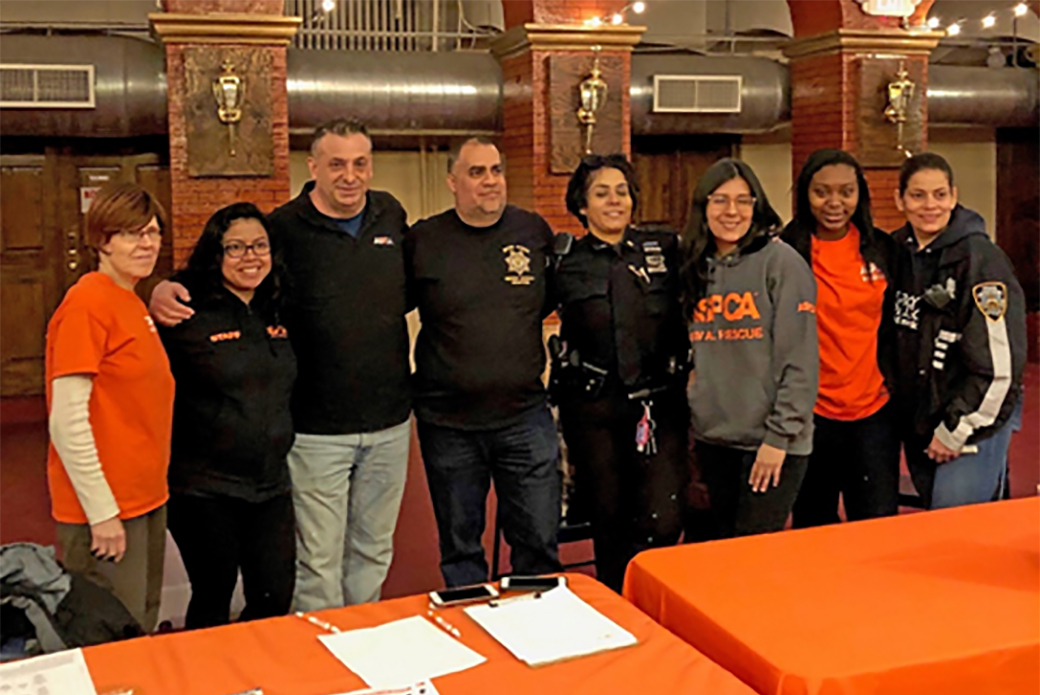 ASPCA Staff and Volunteers with NYPD Officials