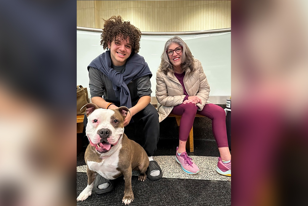 Hayden and Leigh with Potato on adoption day.