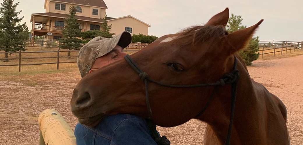 Twister resting her head on John's shoulder