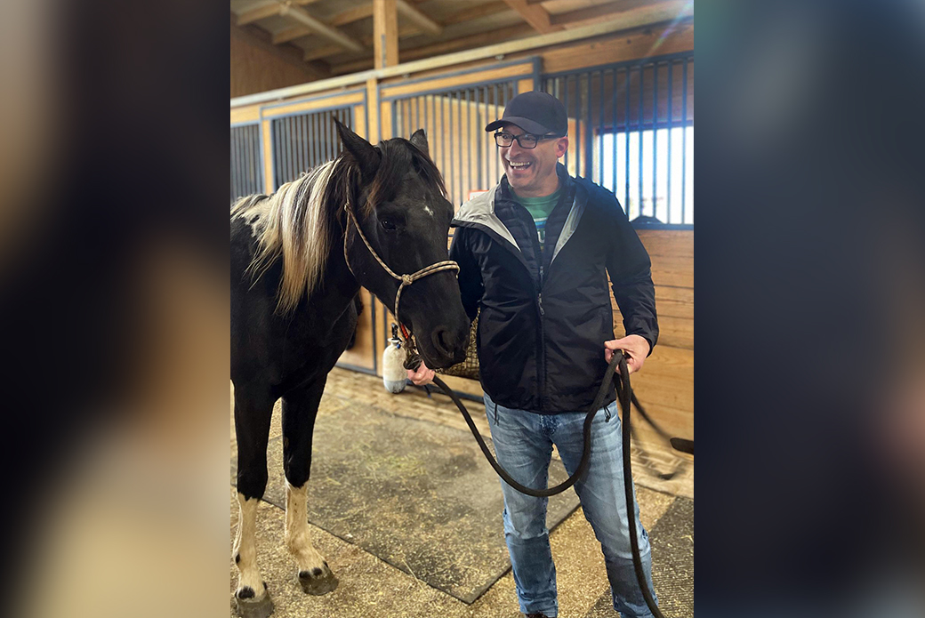 Matt Bershadker with a horse