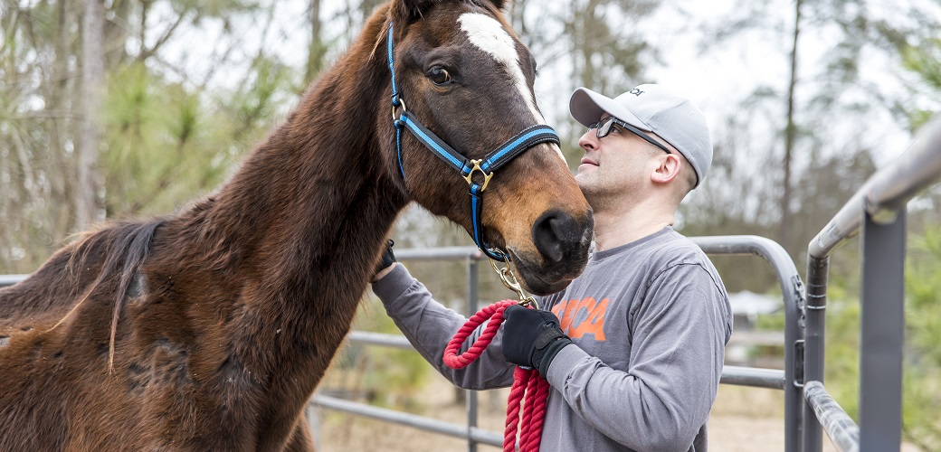 Matt Bershadker with a horse