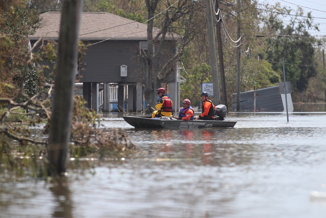 Responders boating through water